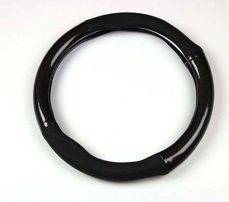 Bọc vô lăng ô tô sợi carbon và da màu đen có logo các hãng ( mẫu 14 )